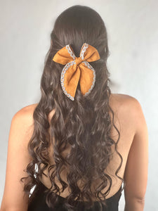“Bow-kissed”