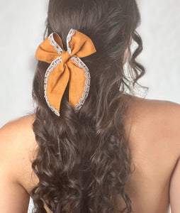 “Bow-kissed”